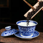 Tea leaves being added to the open millefleurs gaiwan