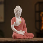 Side profile showing the robe folds and seated posture of the Amitabha sculpture