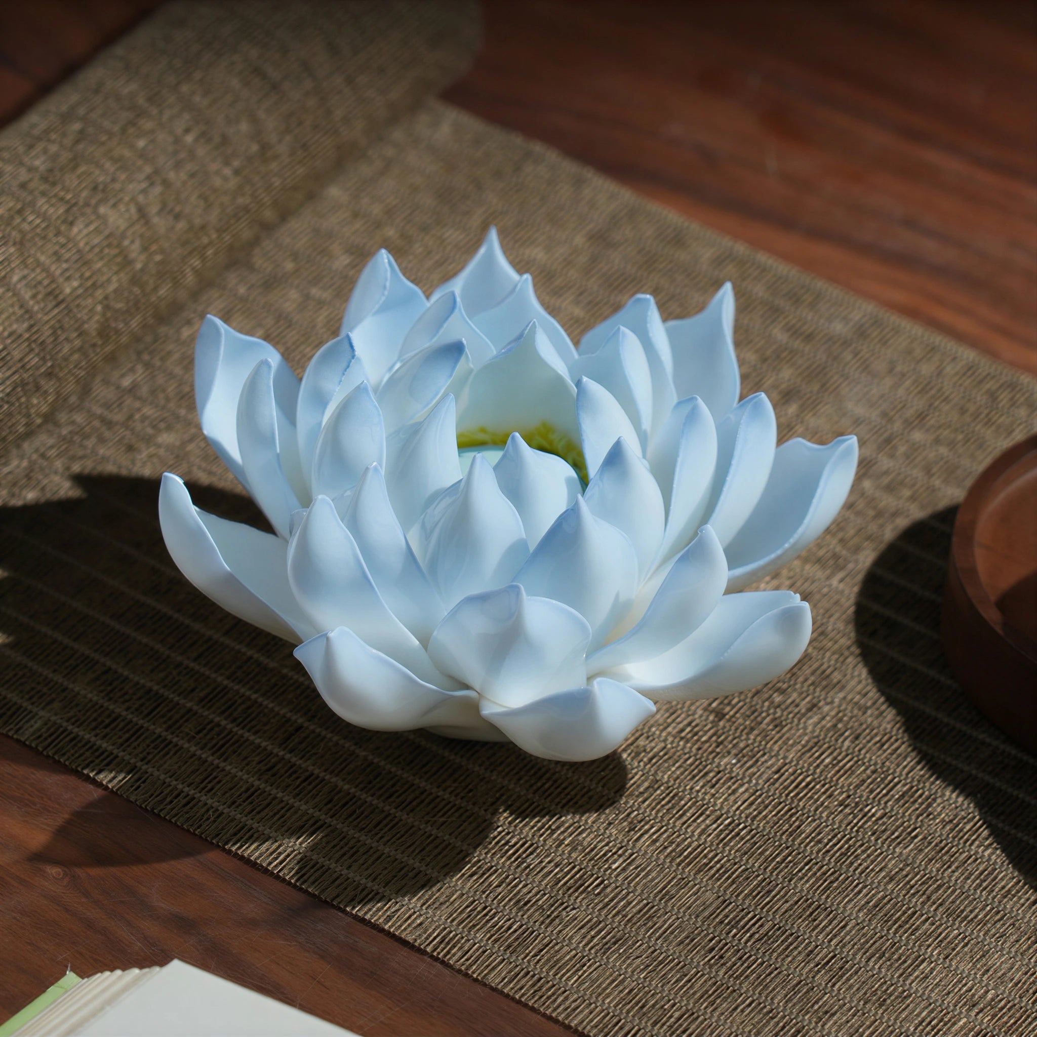 Close view of layered azure blue porcelain lotus petals