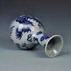 Close view of the cobalt-blue dragon, cloud forms and waves over crackle glaze
