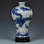 Angled view of the cobalt-blue dragon wrapping around the crackle-glazed Meiping vase