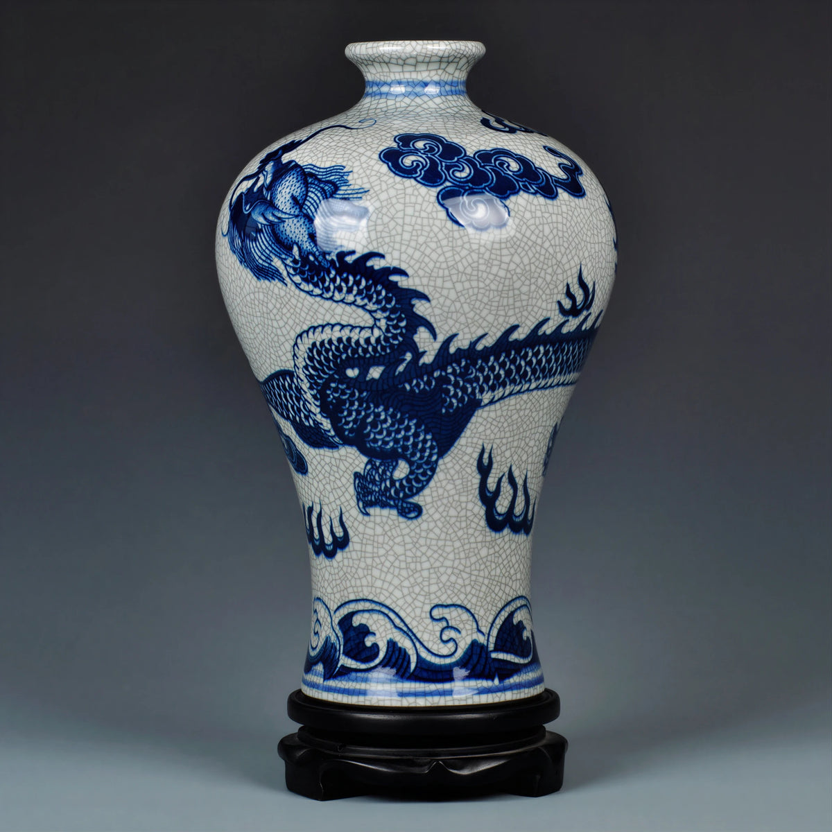 Angled view of the cobalt-blue dragon wrapping around the crackle-glazed Meiping vase