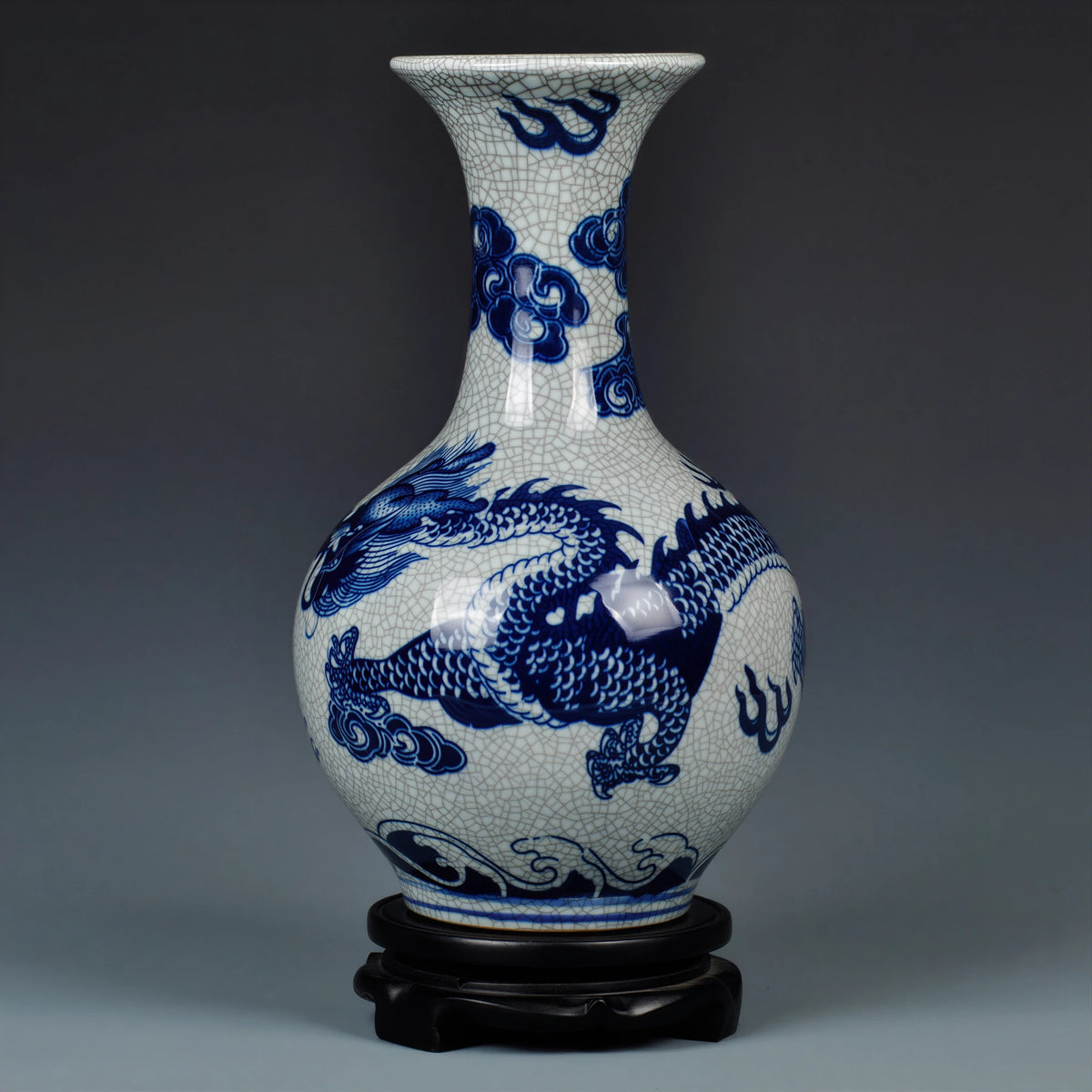 Full view of the cobalt-blue dragon Shangping vase on its fitted wooden stand