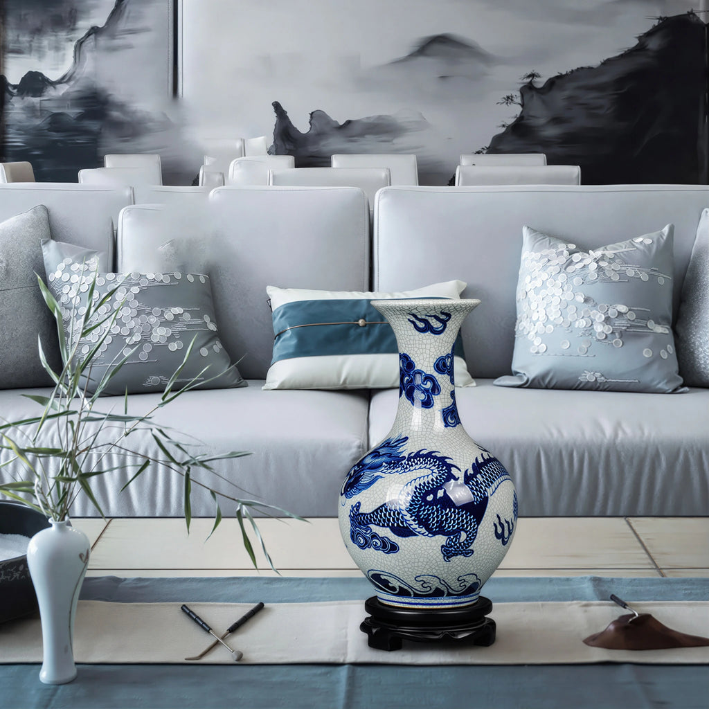 Cobalt dragon crackle vase displayed on its wooden stand in a contemporary living room