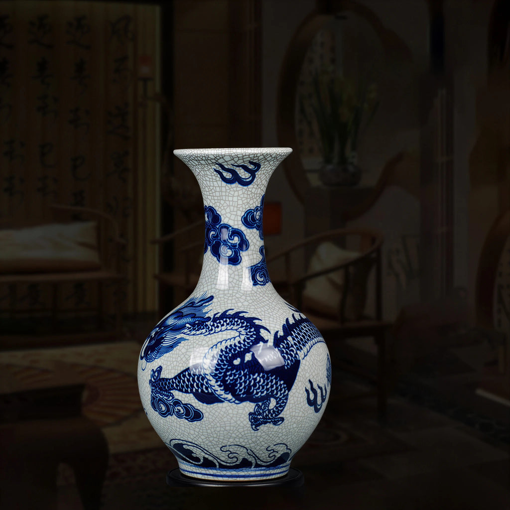 Shangping vase with a flared neck and cobalt-blue dragon shown in a dark interior setting
