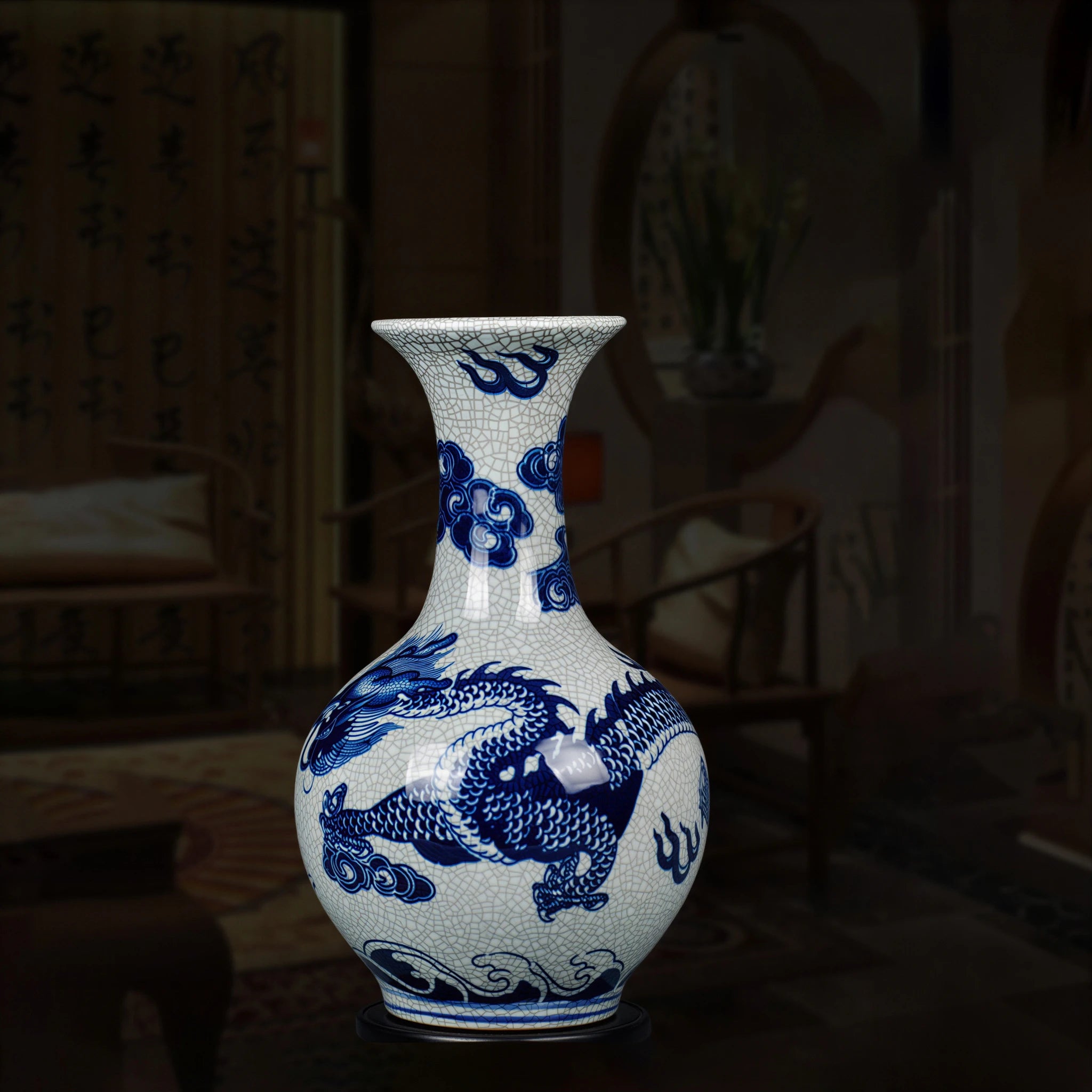 Shangping vase with a flared neck and cobalt-blue dragon shown in a dark interior setting