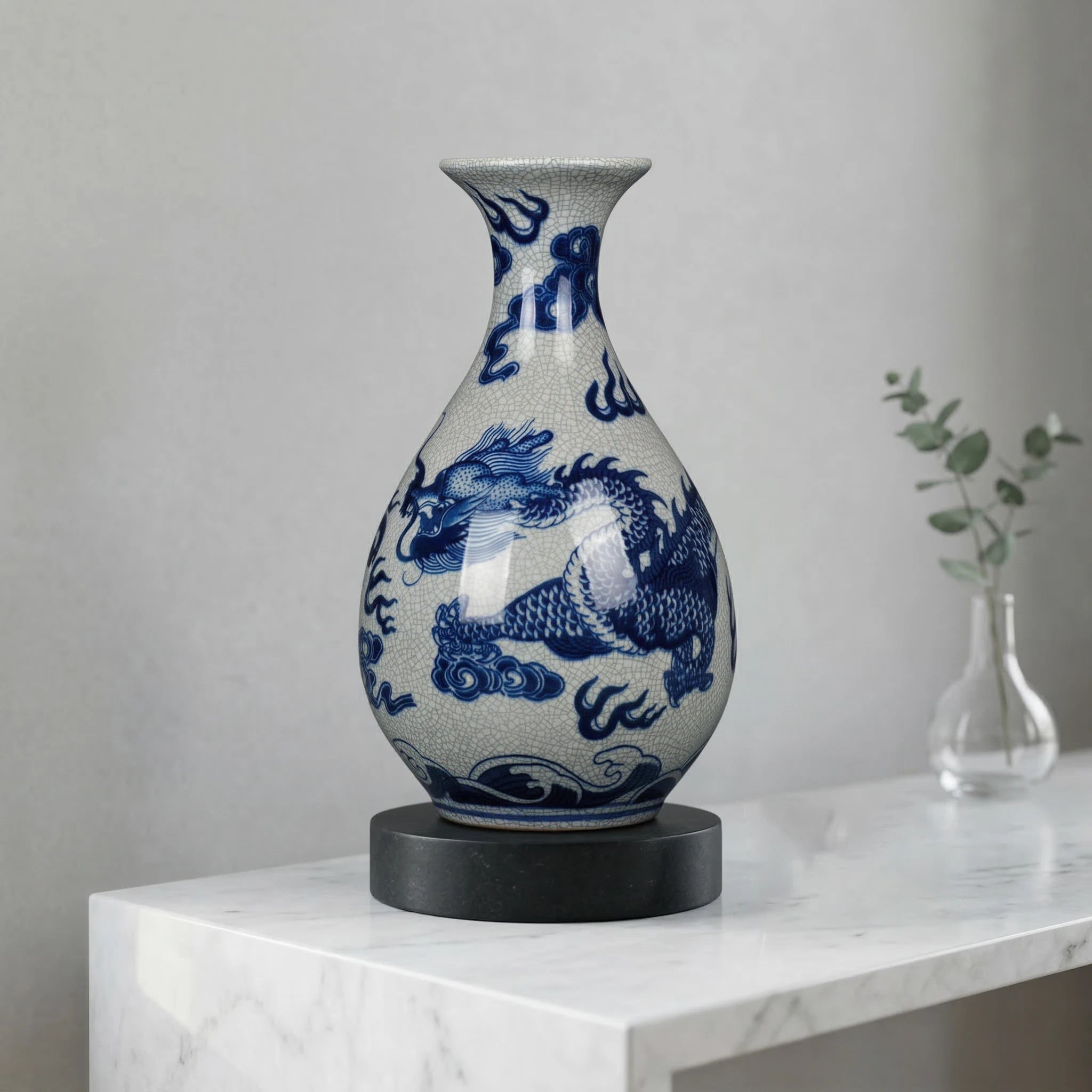 Cobalt dragon Yuhuchun vase displayed on its wooden stand in a living room