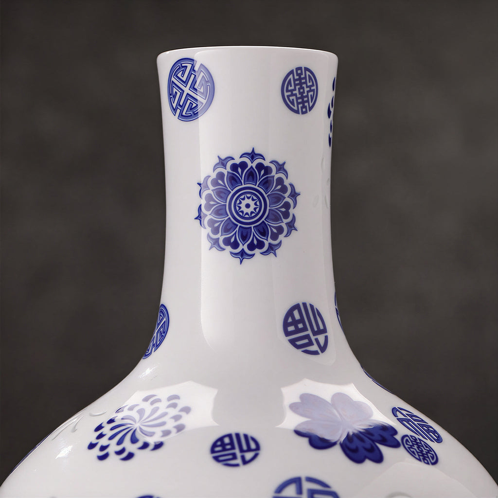Close view of cobalt floral medallions and leaves on the rounded porcelain body