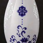 Close view of cobalt lotus decoration between translucent floral linglong windows