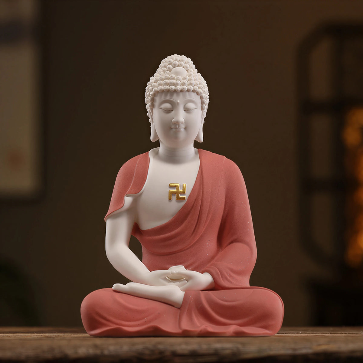 Coral red and white Dehua Amitabha Buddha porcelain sculpture