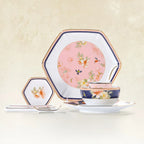 Complete Courtyard in Bloom porcelain tableware set arranged with the large plate, small dishes, bowl, cup, spoon, and tray.