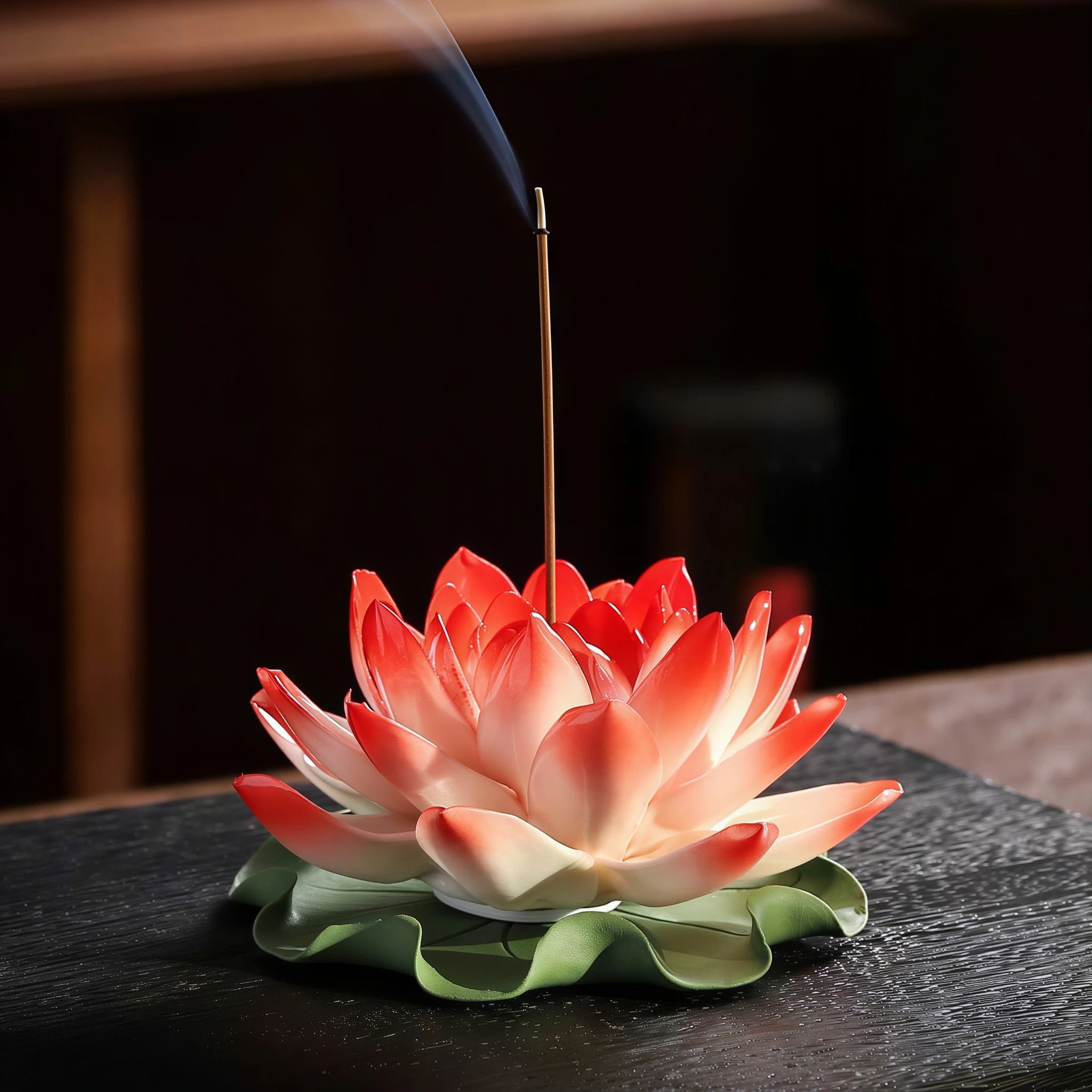 Front view of the crimson red lotus and green lily pad