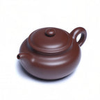 Front view of Dai Chenguang's Fanggu teapot in aged zini