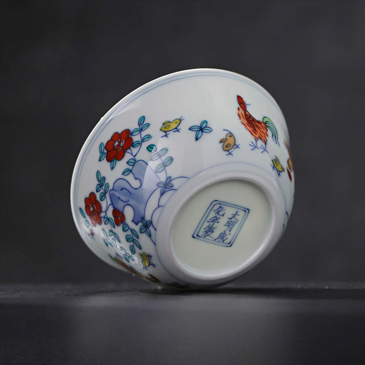 Decorative six-character 大明成化年製 mark within a double square on the cup base