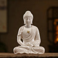 Front view of a gloss-white Dehua Amitabha Buddha seated in meditation