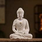 Front view of a gloss-white Dehua Amitabha Buddha seated in meditation