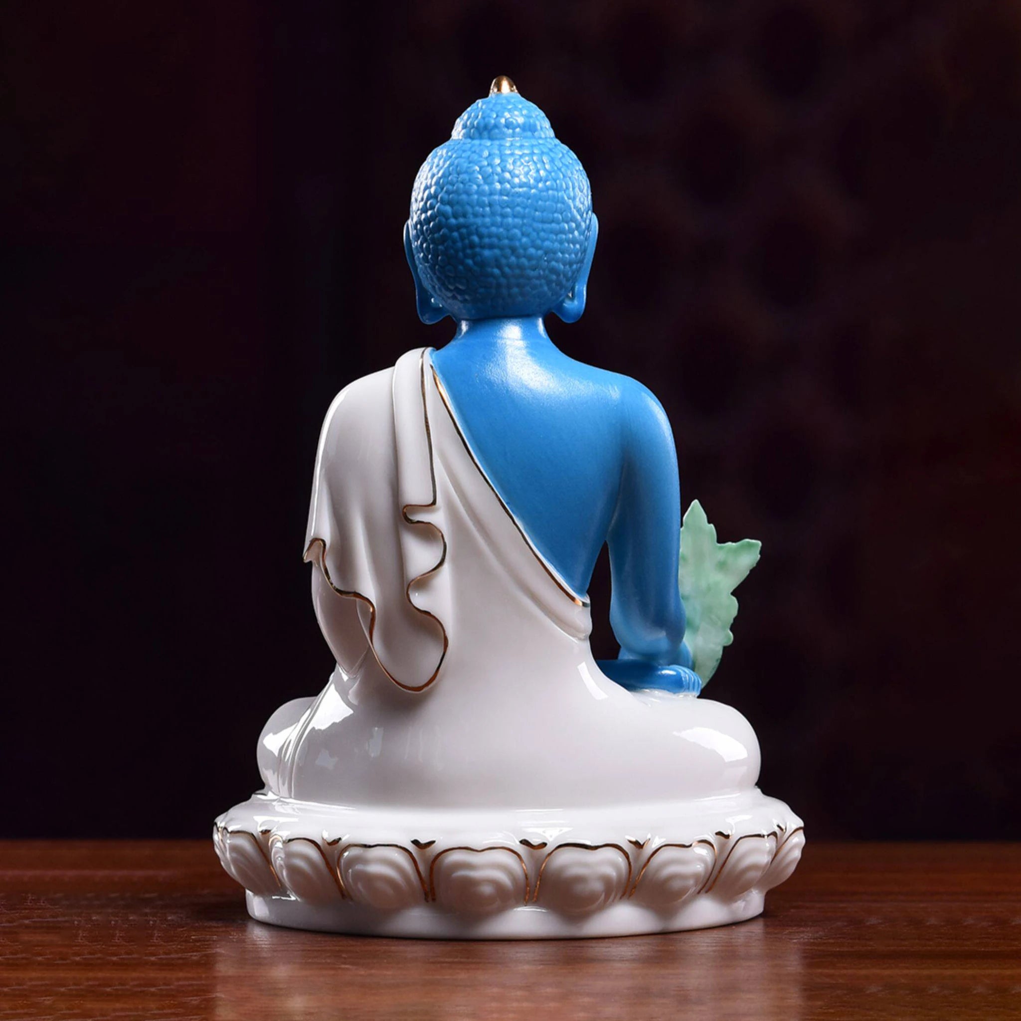 Rear view of the white porcelain robes on the blue Medicine Buddha
