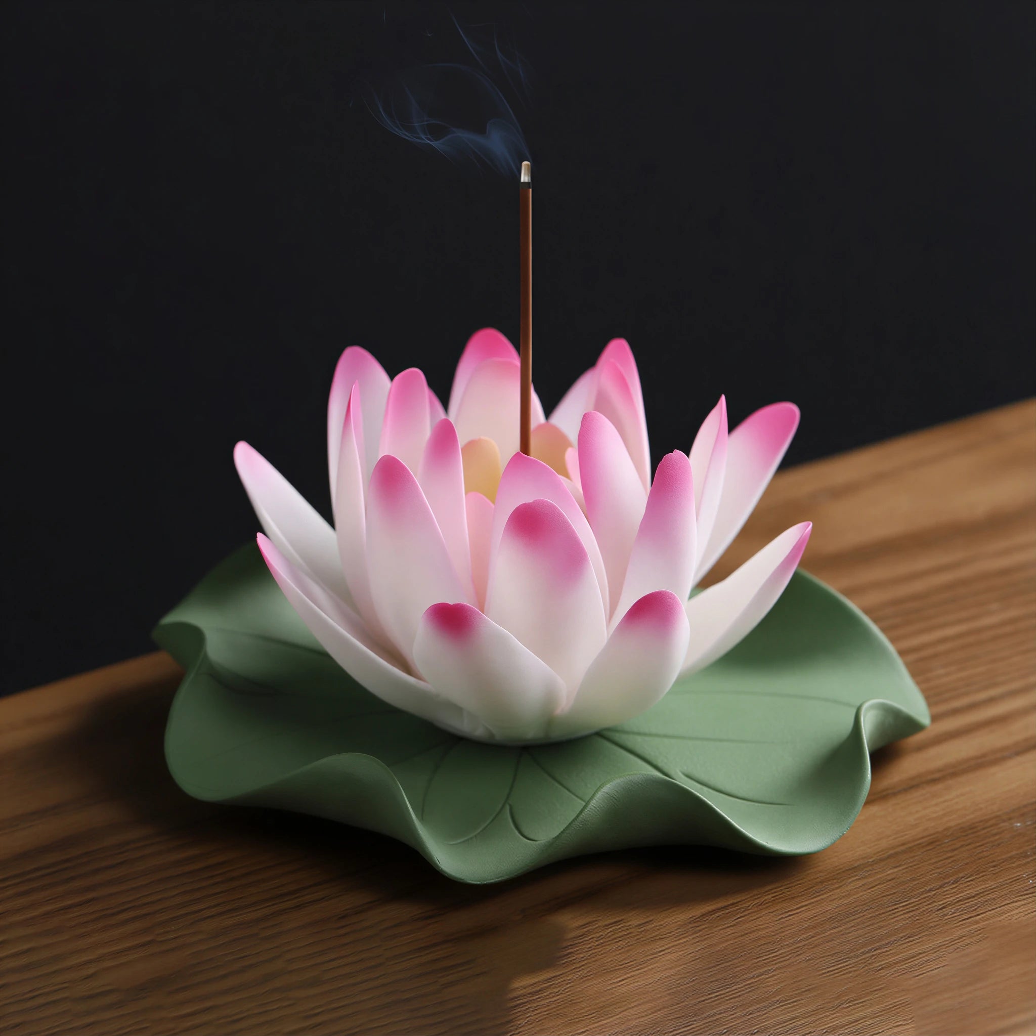 Blush pink porcelain lotus on a green lily pad