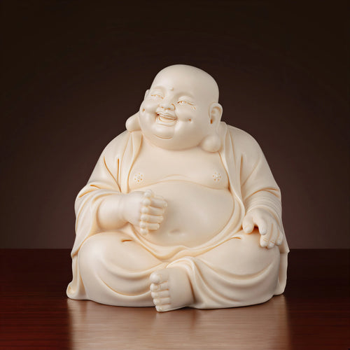 Front view of the warm ivory Dehua Budai Maitreya figure