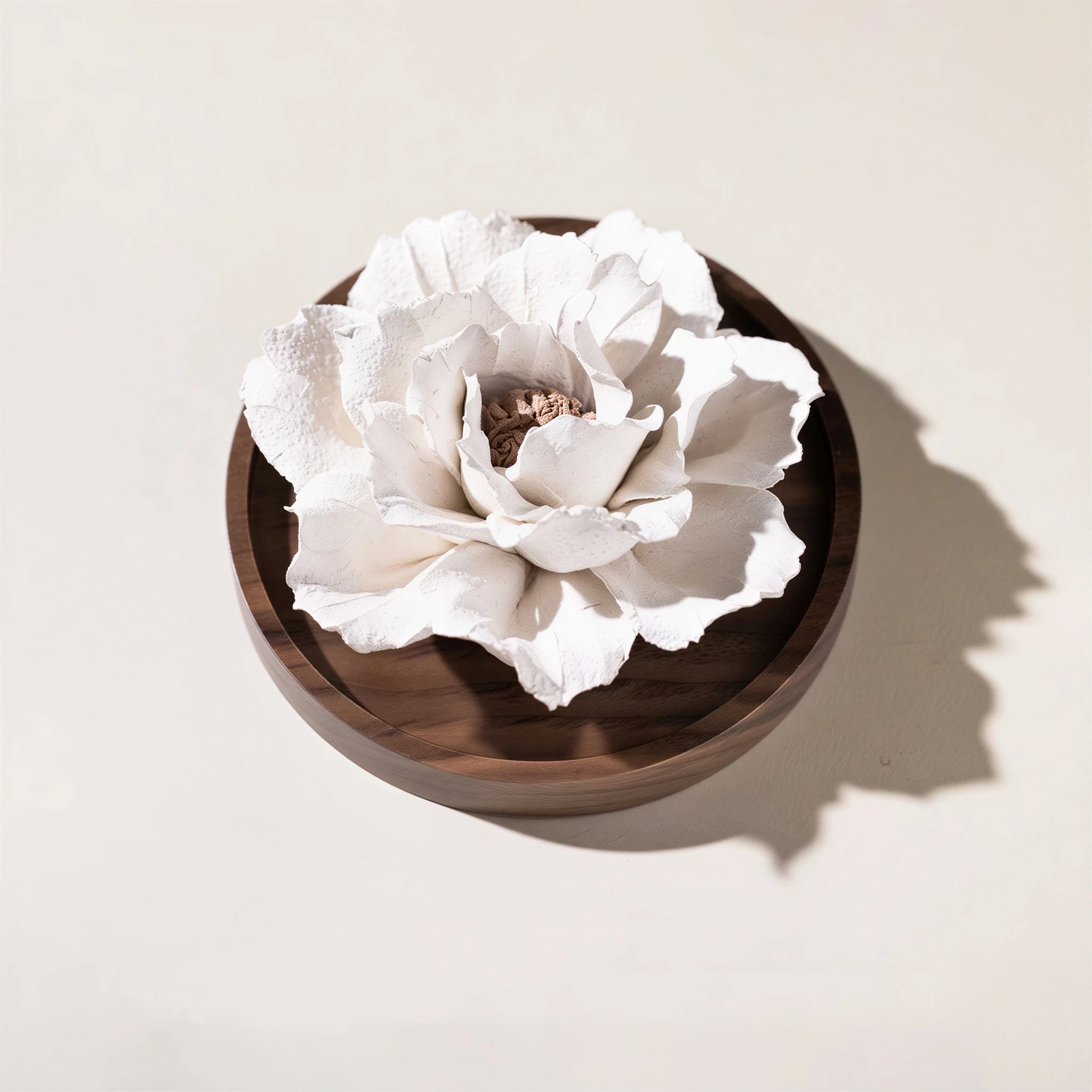 Close view of the three-layer ruffled ceramic petals