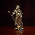 Close angled view of the Guan Gong face and copper-toned finish