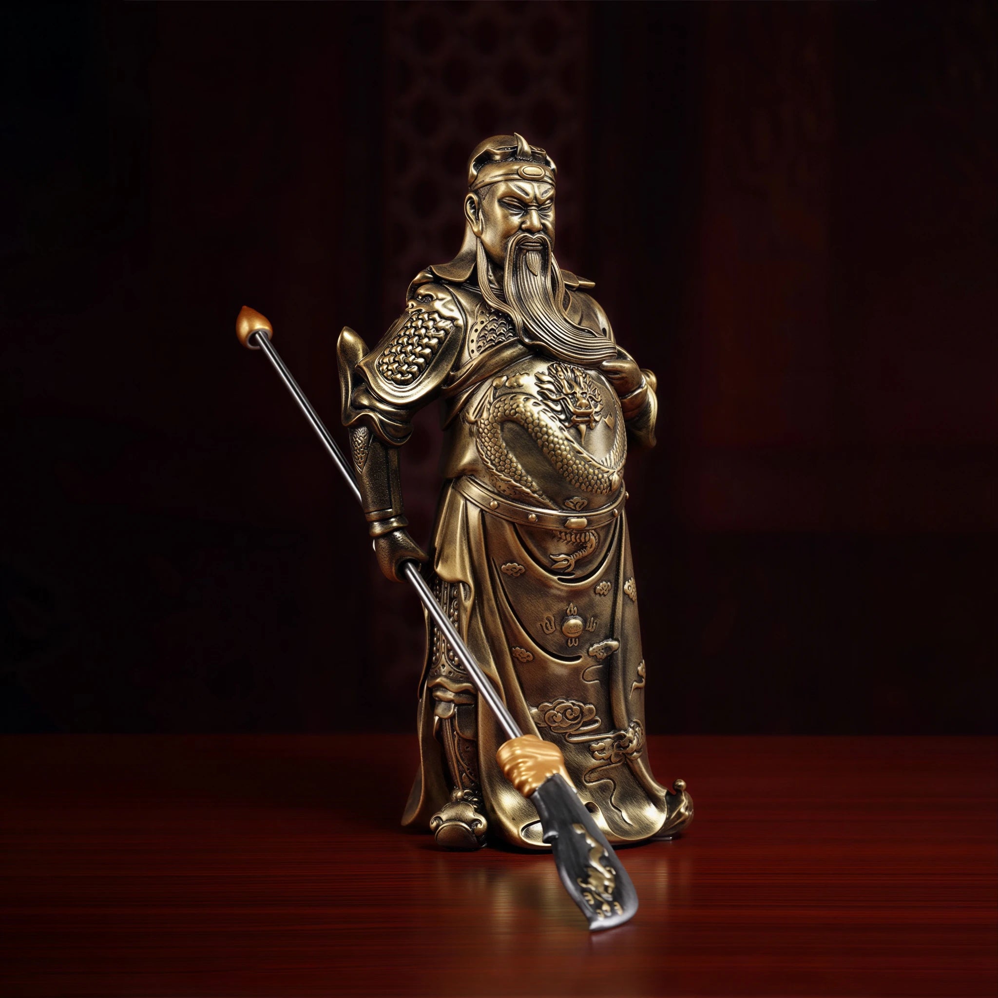 Close angled view of the Guan Gong face and copper-toned finish