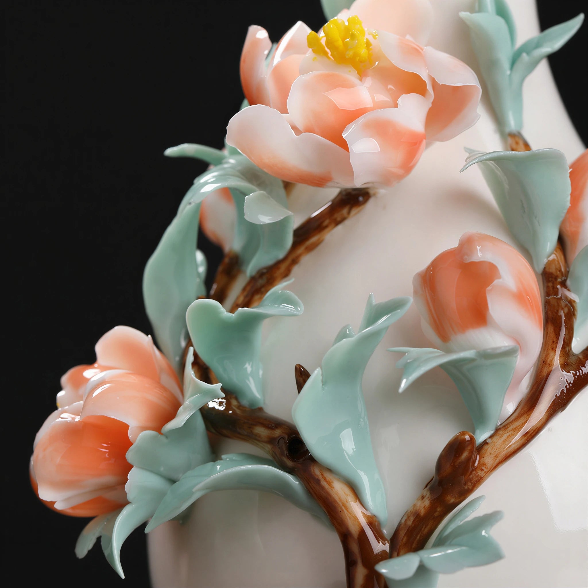 Detailed view of coral peonies, green leaves and the applied brown branch