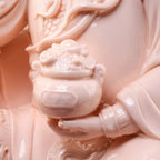 Close view of the impressed mark on the crimson porcelain figure