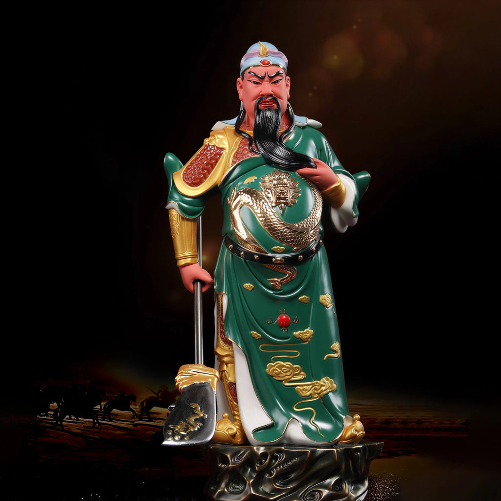 Emerald-robed Guan Gong sculpture shown under directional light