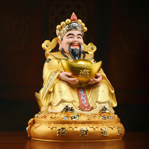 Side view of the pearl-gold Fu Bao Caishen porcelain sculpture