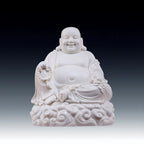 Full view of a glossy white Dehua porcelain Budai Maitreya seated on clouds