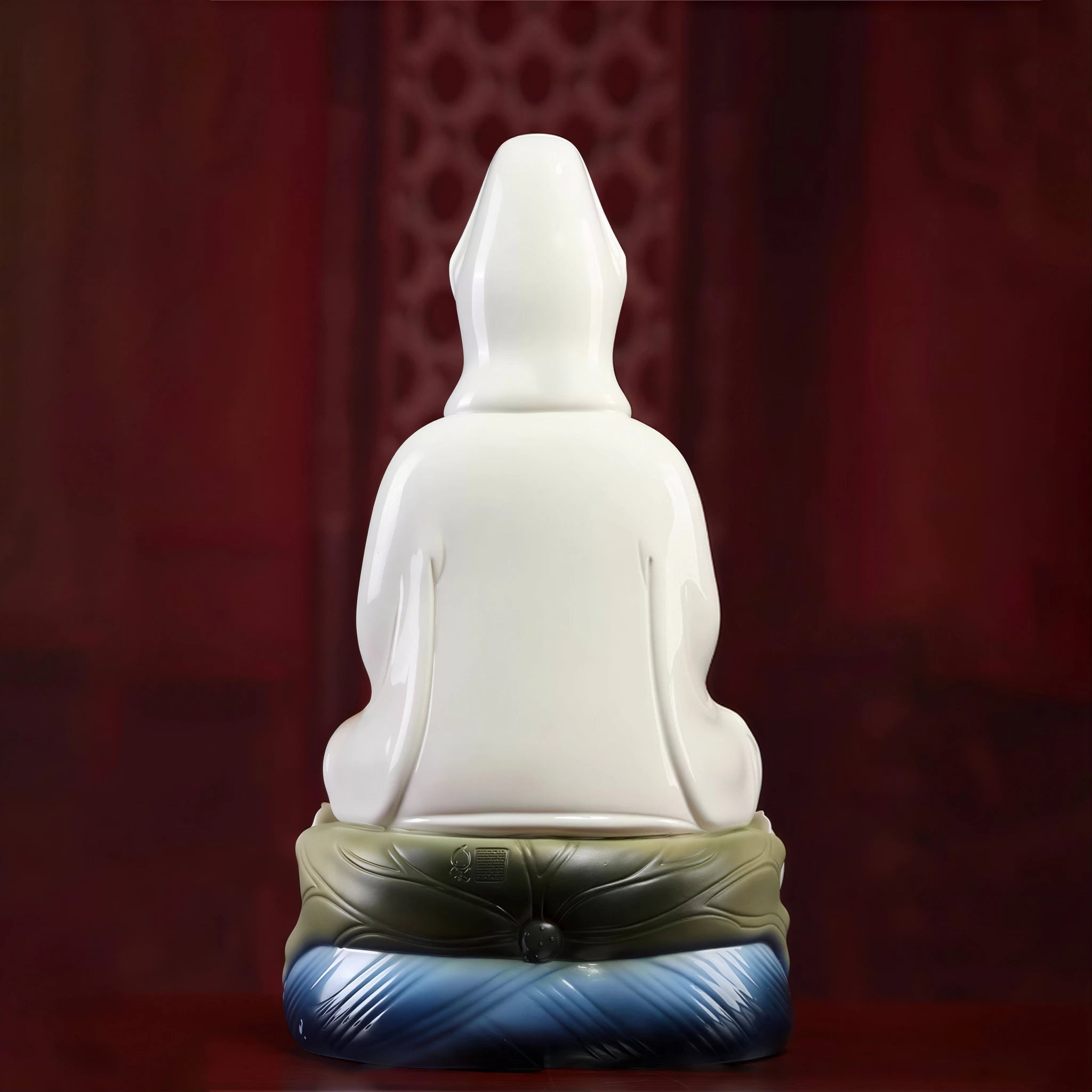Rear view showing the white porcelain back of the Guanyin robe