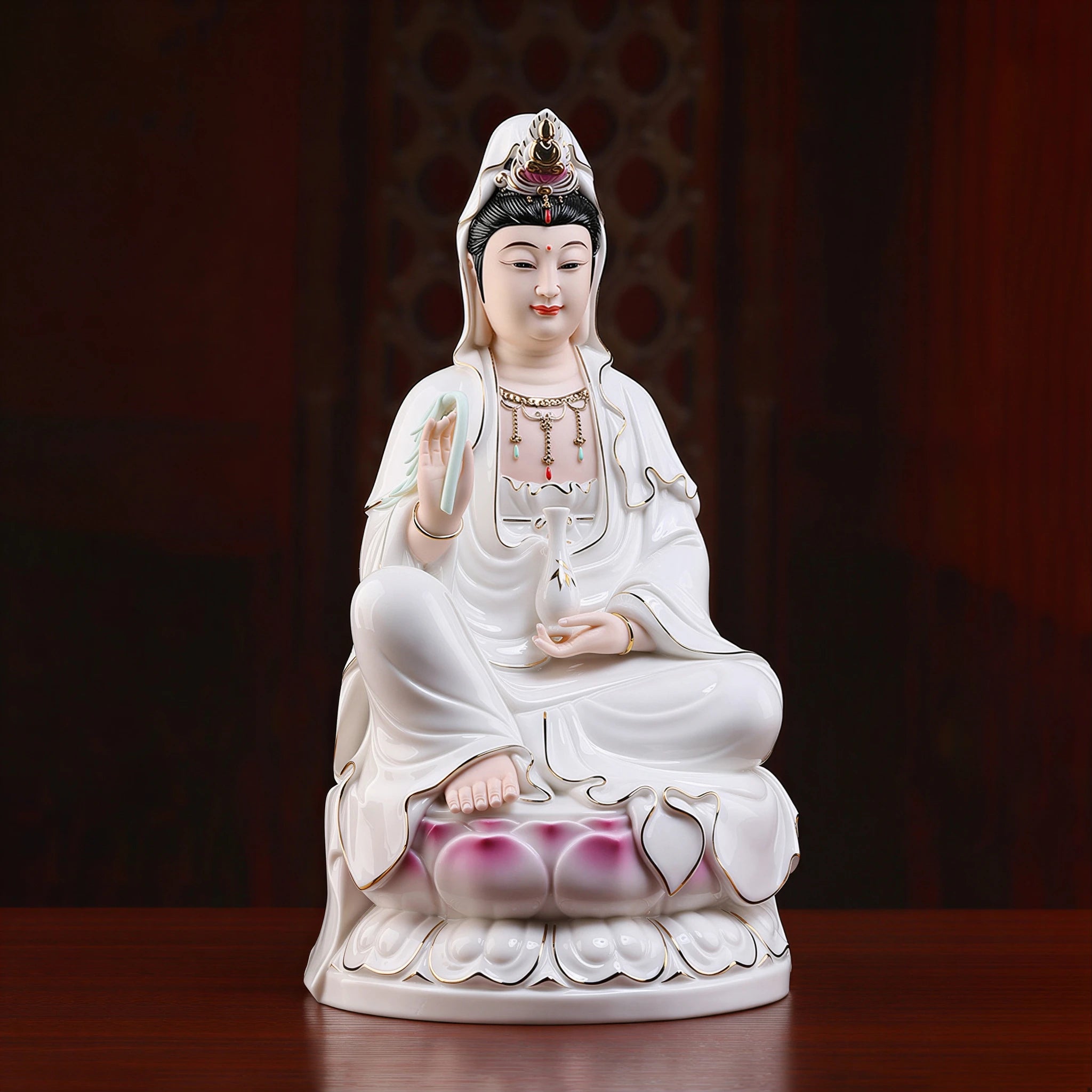 Seated Guanyin with willow branch, vase and pink lotus pedestal