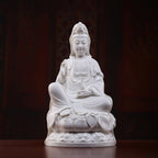 Front view of a white Dehua Guanyin seated in royal ease