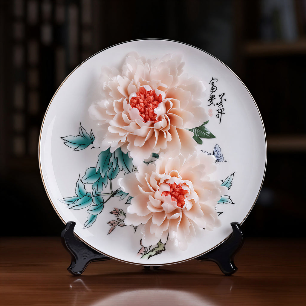 Front view of a Dehua porcelain display plate with hand-modeled peonies