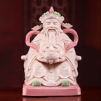 Front view of a jade-red Dehua Civil Caishen holding a treasure bowl