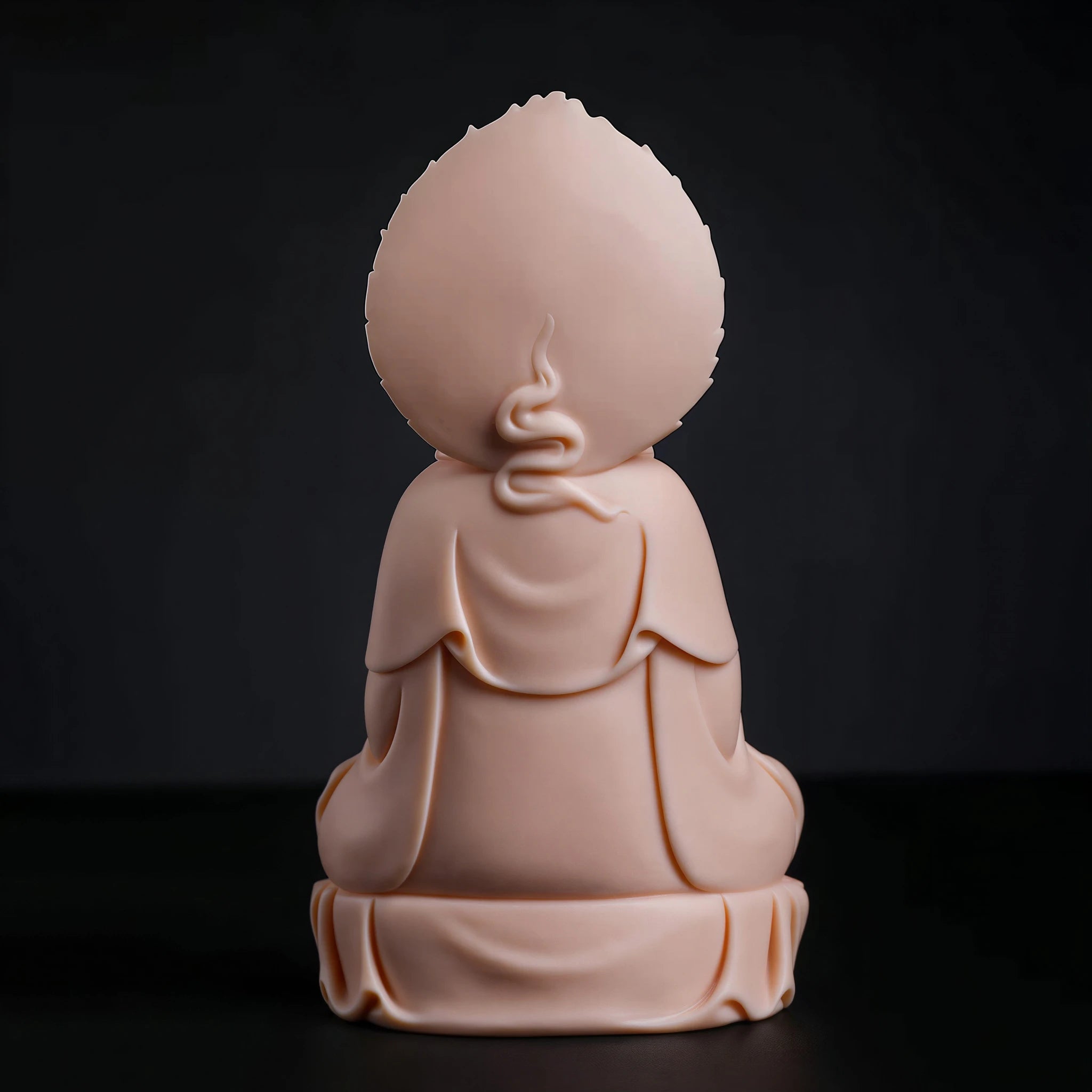Rear view of the Dehua Guanyin sculpture and flame-shaped halo