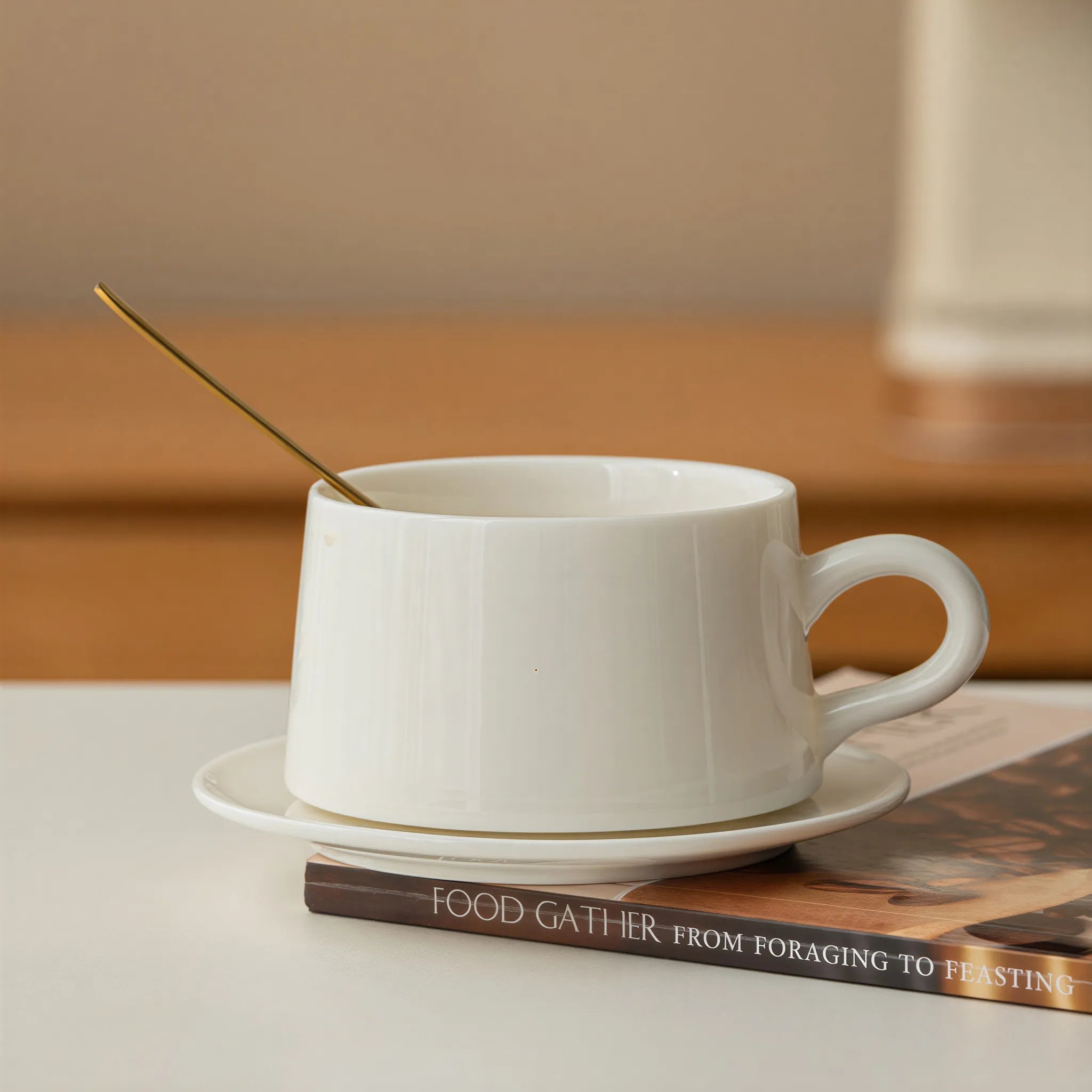 Side profile of the Dehua white porcelain coffee cup with rounded loop handle