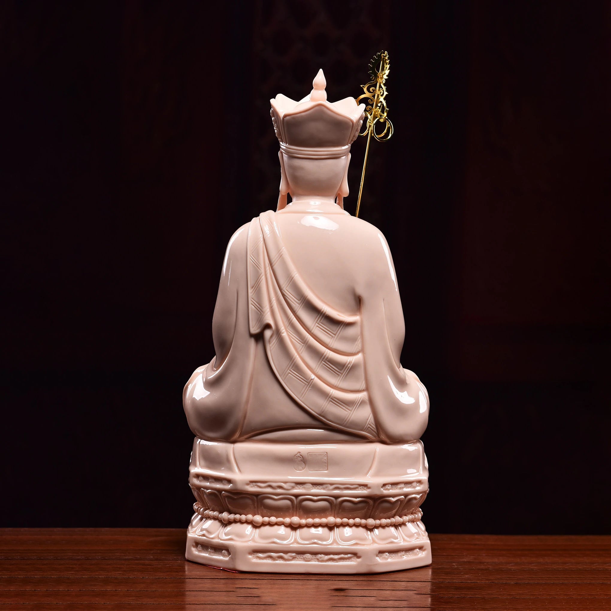 Rear view of the Ksitigarbha red-glazed finish and robes