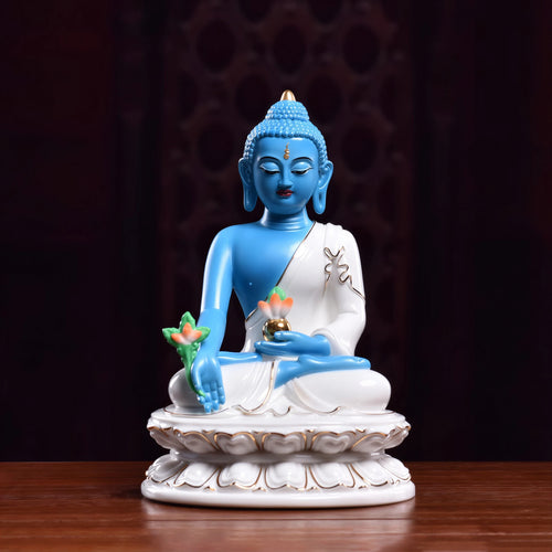 Front view of lapis-blue Dehua porcelain Medicine Buddha with white robes