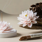 Angled view of the porcelain lotus, base, dome and incense tube