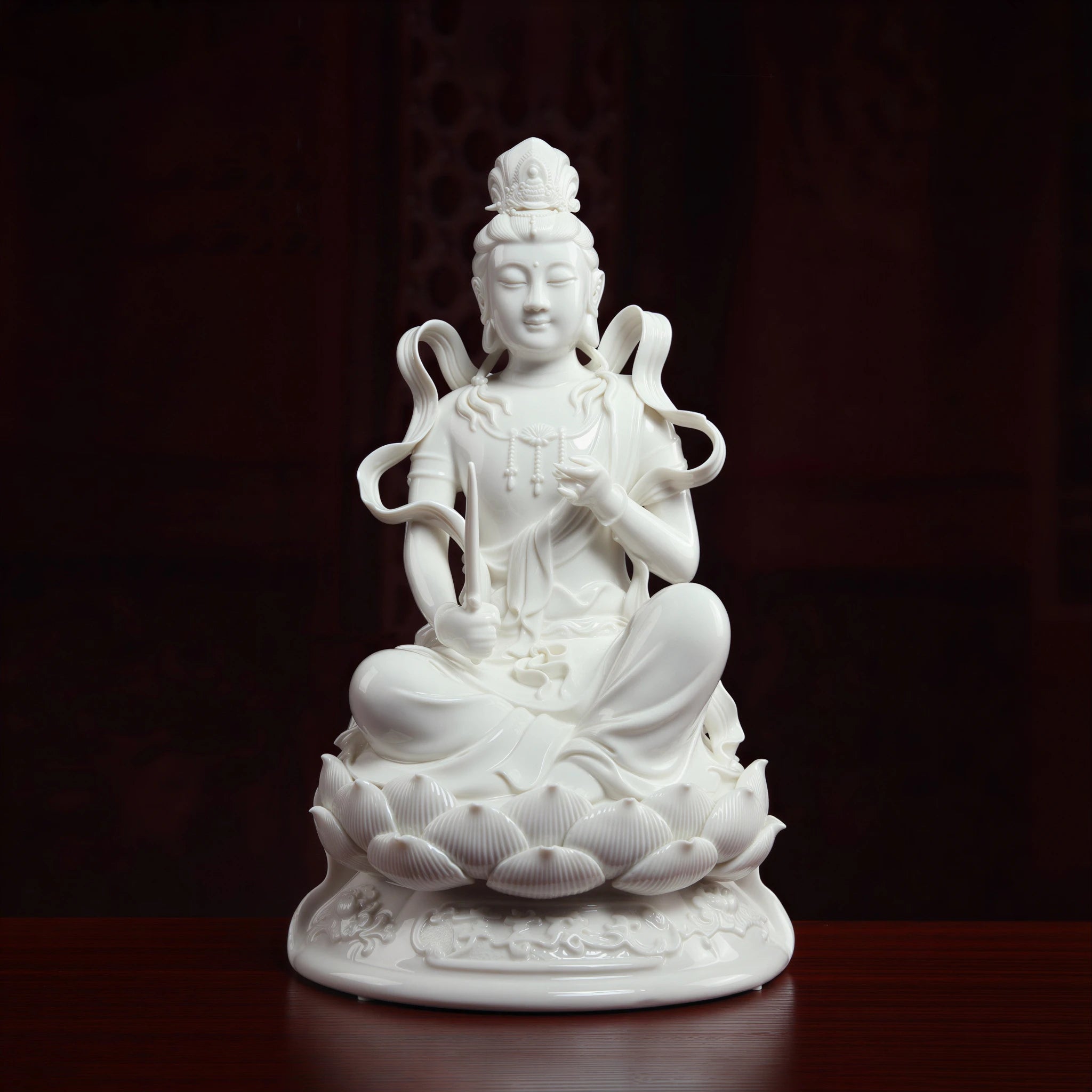 Front view of the jade-white Dehua porcelain Manjushri sculpture