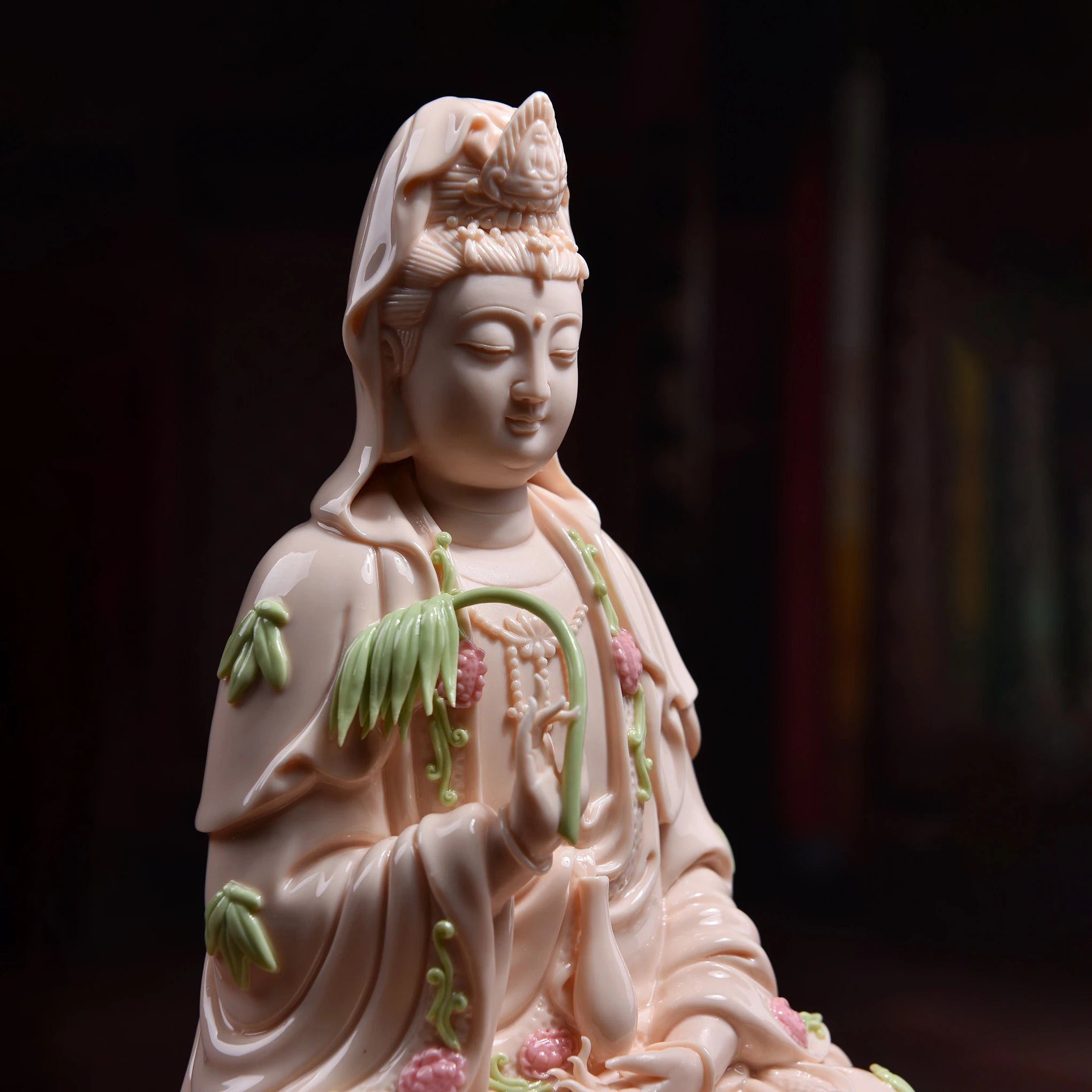 Close view of pale green bamboo and pink blossoms on the rose glaze