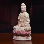 Front view of the Nanhai Guanyin with bamboo and blossom details