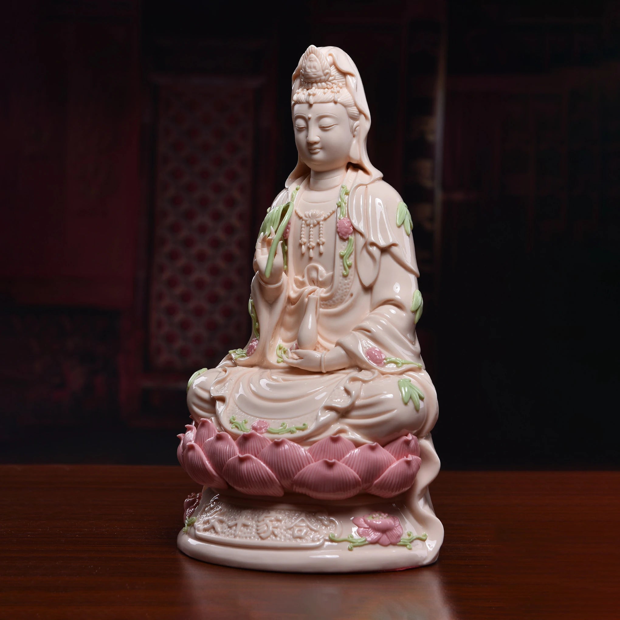 Front view of the Nanhai Guanyin with bamboo and blossom details