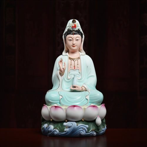 Front view of a Dehua Guanyin in a pale blue robe