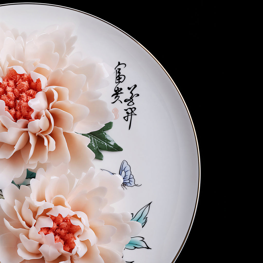 Calligraphy and peony detail on the Dehua porcelain display plate