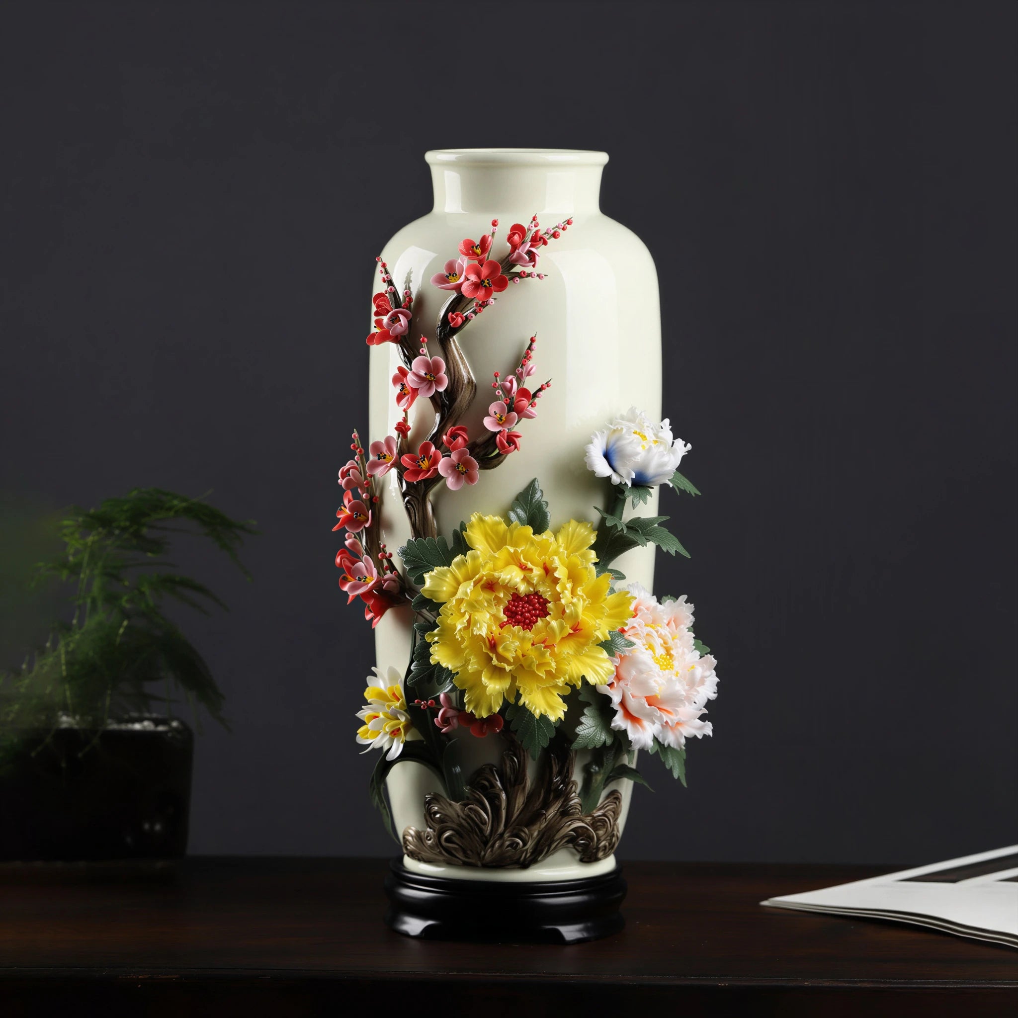 Front view of a tall Dehua porcelain vase with peony, plum blossom and orchid relief