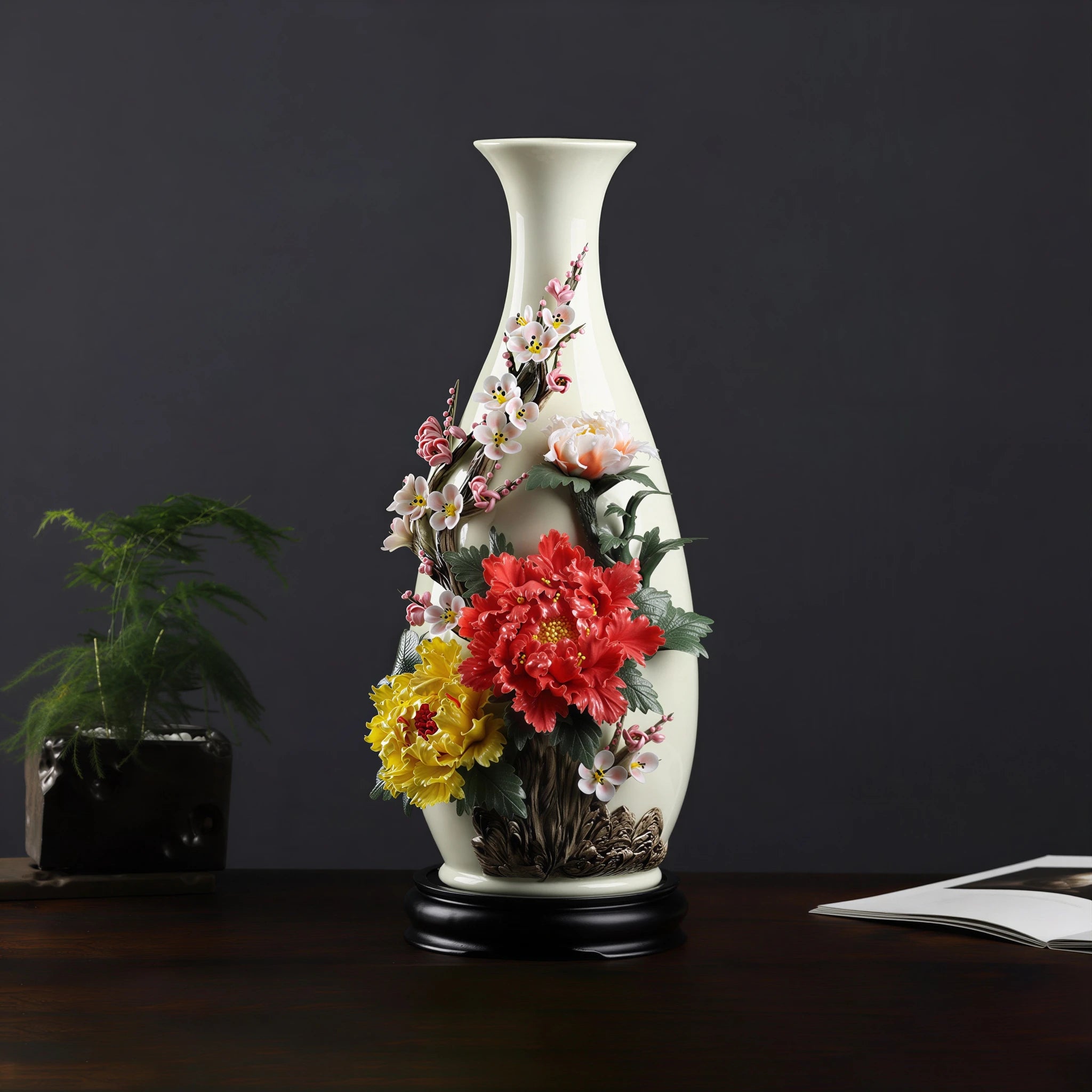 Front view of a Dehua Yuhuchun vase with red, yellow and pale peony relief