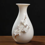 Dehua plum blossom relief vase with presentation box and wooden base